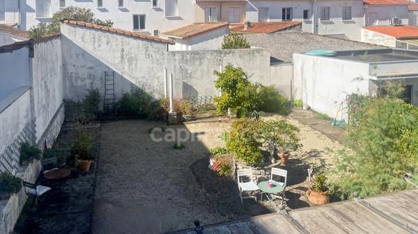 ROYAN, Quartier Eglise Notre-Dame : T3 de 93 m² au 1er étage avec balcon et jardin partagé