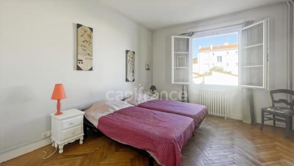 ROYAN, Quartier Eglise Notre-Dame : T3 de 93 m² au 1er étage avec balcon et jardin partagé
