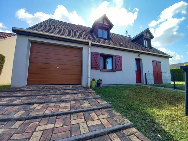 Pavillon familial 3 chambres, garage et terrain