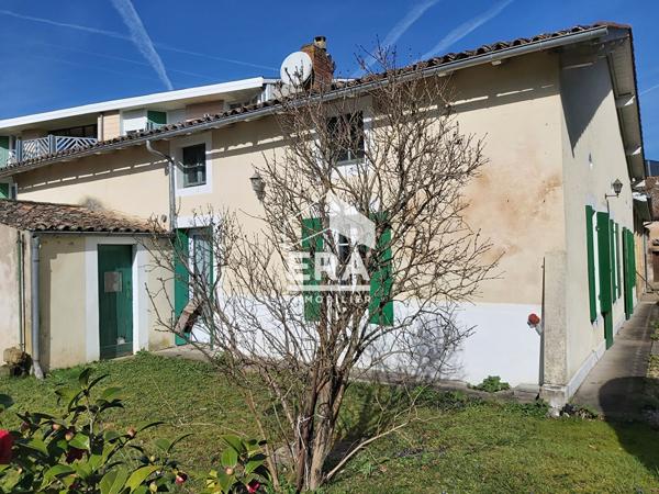 SAINTE FOY LA GRANDE - maison de plain-pied 124m² avec garage et jardin.