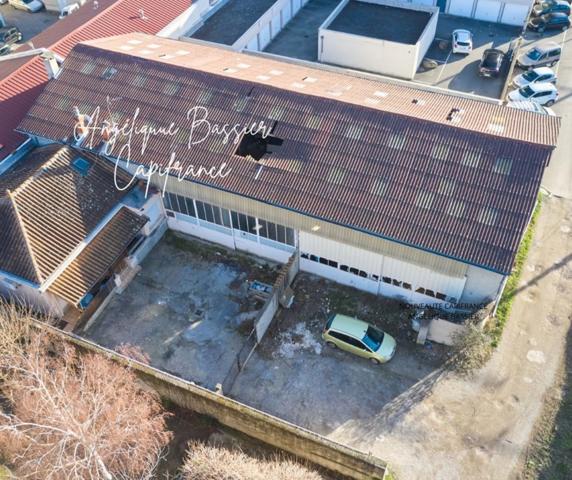 Givors Dépôt d'environ 400m² à réhabiliter avec Maison de 73m² -