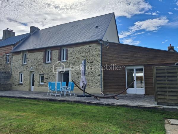 Le Molay-Littry – Charmante maison en pierre rénovée avec fort potentiel, au calme de la campagne

À seulement quelques minutes des commerces et des commodités du Molay-Littry, découvrez cette jolie maison en pierre mitoyenne, entièrement rénovée avec goût, nichée dans un environnement paisible et verdoyant, à l'abri des regards. Un véritable havre de paix où vous profiterez du calme de la campagne tout en restant proche de la ville.

Dès l'entrée, vous serez séduits par une belle pièce de vie lumineuse comprenant  une cuisine aménagée et entièrement équipée. Un couloir dessert un WC indépendant , une jolie dalle de bain, un salon/séjour convivial avec possibilité d'installer un poêle à granulés. Un garage attenant offre un véritable potentiel d'aménagement en chambre, idéal pour créer une vie de plain-pied.

À l'étage, un couloir dessert trois belles chambres confortables ainsi qu'une salle d'eau moderne. 
Un grenier parfaitement isolé vient compléter l'ensemble et offre un espace de stockage appréciable.

À l'extérieur, vous profiterez d'un magnifique terrain d'environ 2 100 m², dont une partie est constructible, laissant libre cours à vos projets d'extension ou de construction. Les amateurs de convivialité apprécieront le terrain de pétanque, parfait pour partager de bons moments en famille ou entre amis.

Une dépendance à rénover représente une belle opportunité pour développer une activité de gîte, de chambres d'hôtes, un atelier ou un espace indépendant. Deux abris de stockage complètent également cette propriété.

Les atouts de ce bien :
Environnement calme à l'abri des regards.
Maison entièrement rénovée, aucun travaux à prévoir.
Portail motorisé.
Assainissement individuel conforme avec fosse septique ayant reçu un avis favorable.
Garage aménageable en chambre pour une vie de plain-pied.
Terrain de 2 100 m² avec partie constructible.
Dépendance offrant un beau potentiel d'aménagement.
Terrain de pétanque.
Grenier isolé et espaces de stockage.
Cadre de vie privilégié, entre campagne et proximité immédiate des services.

Cette propriété s'adapte à de nombreux projets : résidence principale pour une famille en quête de tranquillité, résidence secondaire, activité de gîtes ou de chambres d'hôtes, investissement locatif ou encore projet d'agrandissement grâce à son terrain constructible.

Un bien rare offrant un cadre de vie privilégié et de nombreuses possibilités d'évolution. 
Une visite s'impose pour découvrir tout son potentiel.
Contactez-moi sans tarder pour organiser une visite ! 
«Les informations sur les risques auxquels ce bien est exposé sont disponibles sur le site Géorisques :www.georisques.gouv.fr».