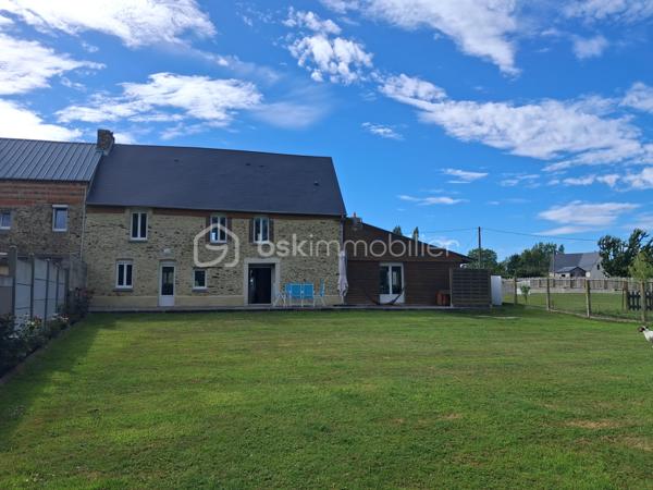 Le Molay-Littry – Charmante maison en pierre rénovée avec fort potentiel, au calme de la campagne

À seulement quelques minutes des commerces et des commodités du Molay-Littry, découvrez cette jolie maison en pierre mitoyenne, entièrement rénovée avec goût, nichée dans un environnement paisible et verdoyant, à l'abri des regards. Un véritable havre de paix où vous profiterez du calme de la campagne tout en restant proche de la ville.

Dès l'entrée, vous serez séduits par une belle pièce de vie lumineuse comprenant  une cuisine aménagée et entièrement équipée. Un couloir dessert un WC indépendant , une jolie dalle de bain, un salon/séjour convivial avec possibilité d'installer un poêle à granulés. Un garage attenant offre un véritable potentiel d'aménagement en chambre, idéal pour créer une vie de plain-pied.

À l'étage, un couloir dessert trois belles chambres confortables ainsi qu'une salle d'eau moderne. 
Un grenier parfaitement isolé vient compléter l'ensemble et offre un espace de stockage appréciable.

À l'extérieur, vous profiterez d'un magnifique terrain d'environ 2 100 m², dont une partie est constructible, laissant libre cours à vos projets d'extension ou de construction. Les amateurs de convivialité apprécieront le terrain de pétanque, parfait pour partager de bons moments en famille ou entre amis.

Une dépendance à rénover représente une belle opportunité pour développer une activité de gîte, de chambres d'hôtes, un atelier ou un espace indépendant. Deux abris de stockage complètent également cette propriété.

Les atouts de ce bien :
Environnement calme à l'abri des regards.
Maison entièrement rénovée, aucun travaux à prévoir.
Portail motorisé.
Assainissement individuel conforme avec fosse septique ayant reçu un avis favorable.
Garage aménageable en chambre pour une vie de plain-pied.
Terrain de 2 100 m² avec partie constructible.
Dépendance offrant un beau potentiel d'aménagement.
Terrain de pétanque.
Grenier isolé et espaces de stockage.
Cadre de vie privilégié, entre campagne et proximité immédiate des services.

Cette propriété s'adapte à de nombreux projets : résidence principale pour une famille en quête de tranquillité, résidence secondaire, activité de gîtes ou de chambres d'hôtes, investissement locatif ou encore projet d'agrandissement grâce à son terrain constructible.

Un bien rare offrant un cadre de vie privilégié et de nombreuses possibilités d'évolution. 
Une visite s'impose pour découvrir tout son potentiel.
Contactez-moi sans tarder pour organiser une visite ! 
«Les informations sur les risques auxquels ce bien est exposé sont disponibles sur le site Géorisques :www.georisques.gouv.fr».
