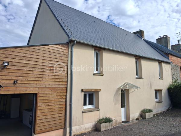 Le Molay-Littry – Charmante maison en pierre rénovée avec fort potentiel, au calme de la campagne

À seulement quelques minutes des commerces et des commodités du Molay-Littry, découvrez cette jolie maison en pierre mitoyenne, entièrement rénovée avec goût, nichée dans un environnement paisible et verdoyant, à l'abri des regards. Un véritable havre de paix où vous profiterez du calme de la campagne tout en restant proche de la ville.

Dès l'entrée, vous serez séduits par une belle pièce de vie lumineuse comprenant  une cuisine aménagée et entièrement équipée. Un couloir dessert un WC indépendant , une jolie dalle de bain, un salon/séjour convivial avec possibilité d'installer un poêle à granulés. Un garage attenant offre un véritable potentiel d'aménagement en chambre, idéal pour créer une vie de plain-pied.

À l'étage, un couloir dessert trois belles chambres confortables ainsi qu'une salle d'eau moderne. 
Un grenier parfaitement isolé vient compléter l'ensemble et offre un espace de stockage appréciable.

À l'extérieur, vous profiterez d'un magnifique terrain d'environ 2 100 m², dont une partie est constructible, laissant libre cours à vos projets d'extension ou de construction. Les amateurs de convivialité apprécieront le terrain de pétanque, parfait pour partager de bons moments en famille ou entre amis.

Une dépendance à rénover représente une belle opportunité pour développer une activité de gîte, de chambres d'hôtes, un atelier ou un espace indépendant. Deux abris de stockage complètent également cette propriété.

Les atouts de ce bien :
Environnement calme à l'abri des regards.
Maison entièrement rénovée, aucun travaux à prévoir.
Portail motorisé.
Assainissement individuel conforme avec fosse septique ayant reçu un avis favorable.
Garage aménageable en chambre pour une vie de plain-pied.
Terrain de 2 100 m² avec partie constructible.
Dépendance offrant un beau potentiel d'aménagement.
Terrain de pétanque.
Grenier isolé et espaces de stockage.
Cadre de vie privilégié, entre campagne et proximité immédiate des services.

Cette propriété s'adapte à de nombreux projets : résidence principale pour une famille en quête de tranquillité, résidence secondaire, activité de gîtes ou de chambres d'hôtes, investissement locatif ou encore projet d'agrandissement grâce à son terrain constructible.

Un bien rare offrant un cadre de vie privilégié et de nombreuses possibilités d'évolution. 
Une visite s'impose pour découvrir tout son potentiel.
Contactez-moi sans tarder pour organiser une visite ! 
«Les informations sur les risques auxquels ce bien est exposé sont disponibles sur le site Géorisques :www.georisques.gouv.fr».
