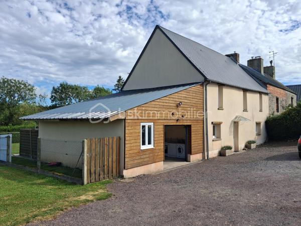 Le Molay-Littry – Charmante maison en pierre rénovée avec fort potentiel, au calme de la campagne

À seulement quelques minutes des commerces et des commodités du Molay-Littry, découvrez cette jolie maison en pierre mitoyenne, entièrement rénovée avec goût, nichée dans un environnement paisible et verdoyant, à l'abri des regards. Un véritable havre de paix où vous profiterez du calme de la campagne tout en restant proche de la ville.

Dès l'entrée, vous serez séduits par une belle pièce de vie lumineuse comprenant  une cuisine aménagée et entièrement équipée. Un couloir dessert un WC indépendant , une jolie dalle de bain, un salon/séjour convivial avec possibilité d'installer un poêle à granulés. Un garage attenant offre un véritable potentiel d'aménagement en chambre, idéal pour créer une vie de plain-pied.

À l'étage, un couloir dessert trois belles chambres confortables ainsi qu'une salle d'eau moderne. 
Un grenier parfaitement isolé vient compléter l'ensemble et offre un espace de stockage appréciable.

À l'extérieur, vous profiterez d'un magnifique terrain d'environ 2 100 m², dont une partie est constructible, laissant libre cours à vos projets d'extension ou de construction. Les amateurs de convivialité apprécieront le terrain de pétanque, parfait pour partager de bons moments en famille ou entre amis.

Une dépendance à rénover représente une belle opportunité pour développer une activité de gîte, de chambres d'hôtes, un atelier ou un espace indépendant. Deux abris de stockage complètent également cette propriété.

Les atouts de ce bien :
Environnement calme à l'abri des regards.
Maison entièrement rénovée, aucun travaux à prévoir.
Portail motorisé.
Assainissement individuel conforme avec fosse septique ayant reçu un avis favorable.
Garage aménageable en chambre pour une vie de plain-pied.
Terrain de 2 100 m² avec partie constructible.
Dépendance offrant un beau potentiel d'aménagement.
Terrain de pétanque.
Grenier isolé et espaces de stockage.
Cadre de vie privilégié, entre campagne et proximité immédiate des services.

Cette propriété s'adapte à de nombreux projets : résidence principale pour une famille en quête de tranquillité, résidence secondaire, activité de gîtes ou de chambres d'hôtes, investissement locatif ou encore projet d'agrandissement grâce à son terrain constructible.

Un bien rare offrant un cadre de vie privilégié et de nombreuses possibilités d'évolution. 
Une visite s'impose pour découvrir tout son potentiel.
Contactez-moi sans tarder pour organiser une visite ! 
«Les informations sur les risques auxquels ce bien est exposé sont disponibles sur le site Géorisques :www.georisques.gouv.fr».
