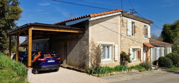 Charme, jardin et carport.