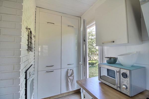 Maison individuelle de 133 m² utiles sur terrain de 451 m² cave buanderie cuisine d'été et appenti