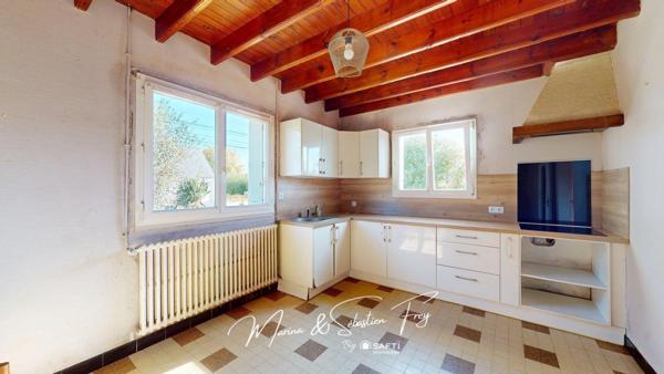 Maison traditionnelle avec beau potentiel proche des commerces