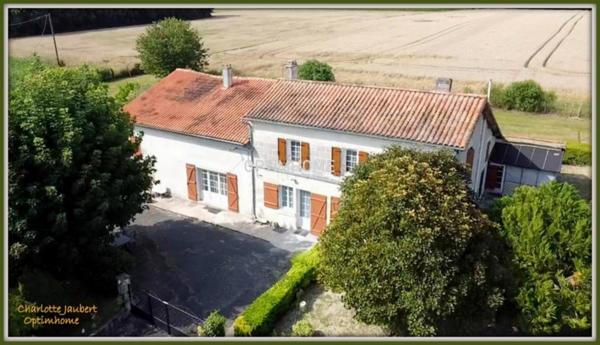 Grande maison divisée en 2 habitations