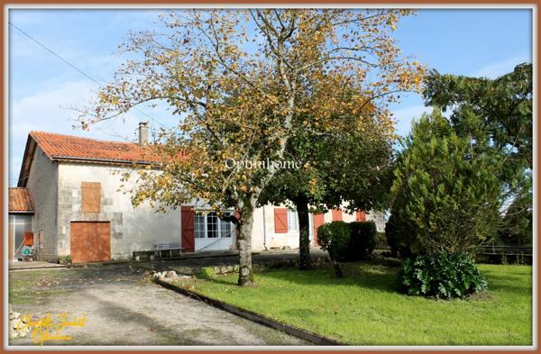 Grande maison divisée en 2 habitations