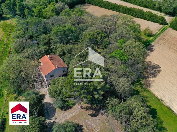 Maison à rénover au coeur de 2 hectares de nature