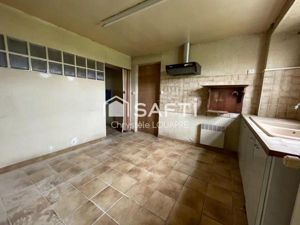 Maison ancienne à rénover avec chai et garage attenants
