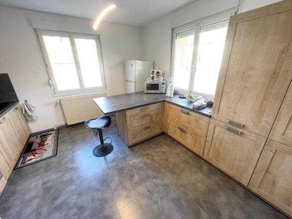 Maison mitoyenne F5 avec terrain, terrasse, parking et garage