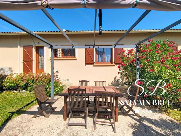 Maison familiale de plain-pied, garage et environnement calme