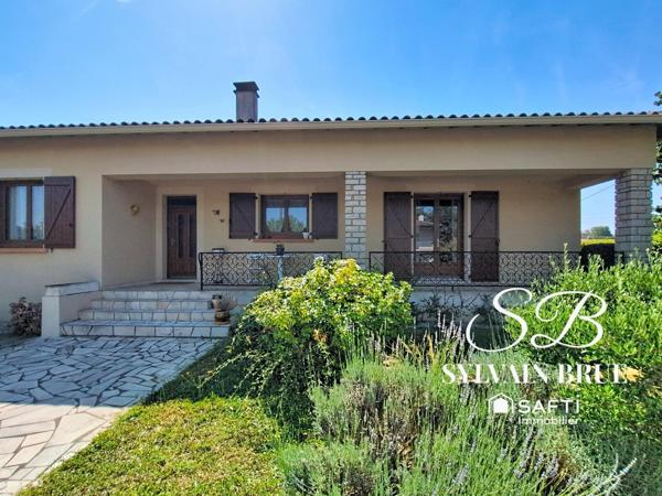 Maison familiale de plain-pied, garage et environnement calme