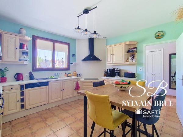 Maison familiale de plain-pied, garage et environnement calme