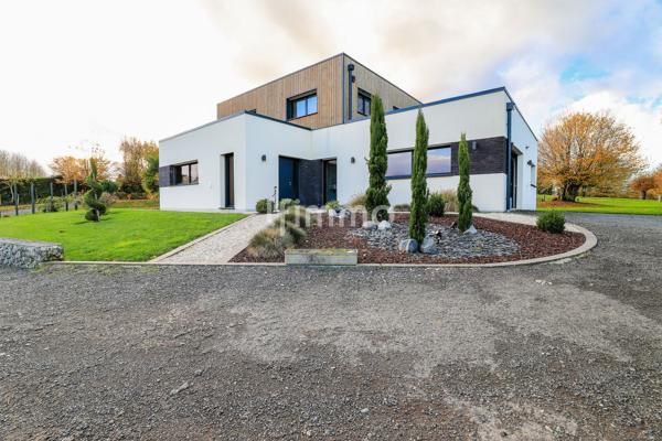 Superbe Maison Moderne sur Terrain Paysagé de 7030 m² – 603 000 €