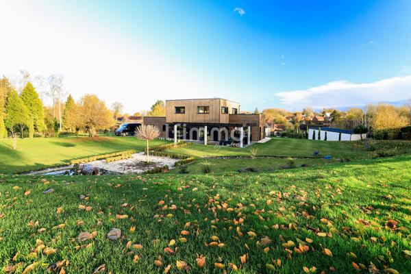 Superbe Maison Moderne sur Terrain Paysagé de 7030 m² – 603 000 €