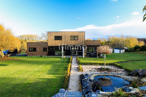 Superbe Maison Moderne sur Terrain Paysagé de 7030 m² – 603 000 €