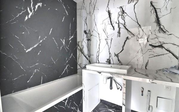 Immeuble à vendre    10 pièces • 235 m2 Paris 18