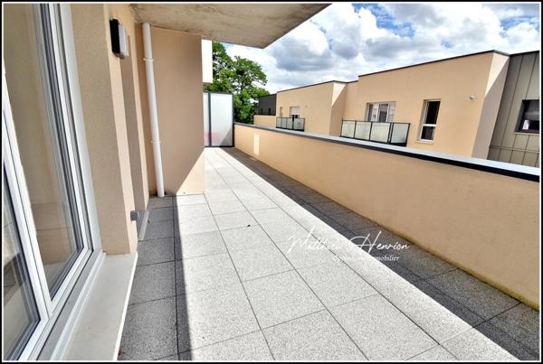 À Rouen Rive Droite, un appartement de 2023 avec terrasse et parking en sous-sol, DPE C