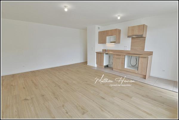 À Rouen Rive Droite, un appartement de 2023 avec terrasse et parking en sous-sol, DPE C