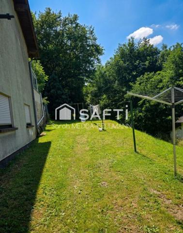 MAISON INDIVIDUELLE DANS CADRE VERDOYANT