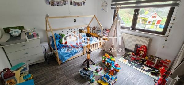 MAISON INDIVIDUELLE DANS CADRE VERDOYANT