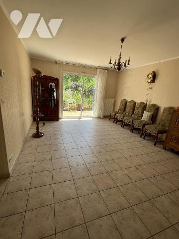 Pavillon 2 chambres, mezzanine, garage, jardin.
