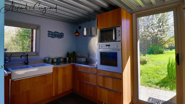 A vendre MONTEGUT LAURAGAIS (31) - Grange rénovée de 130 m², 4 chambres, piscine et terrain de 5 500 m²