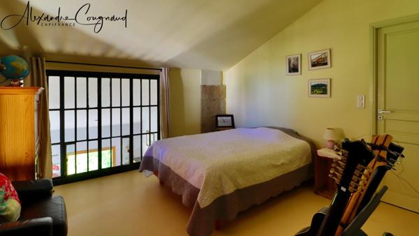 A vendre MONTEGUT LAURAGAIS (31) - Grange rénovée de 130 m², 4 chambres, piscine et terrain de 5 500 m²