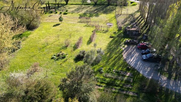 A vendre MONTEGUT LAURAGAIS (31) - Grange rénovée de 130 m², 4 chambres, piscine et terrain de 5 500 m²