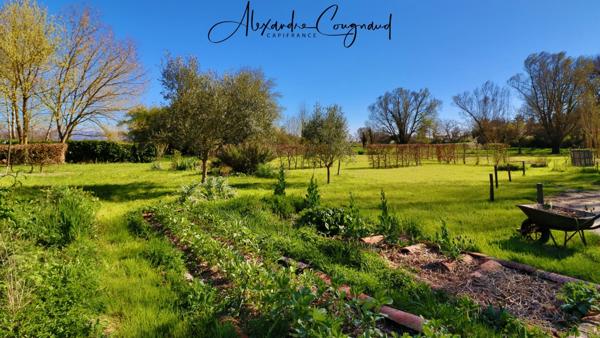 A vendre MONTEGUT LAURAGAIS (31) - Grange rénovée de 130 m², 4 chambres, piscine et terrain de 5 500 m²