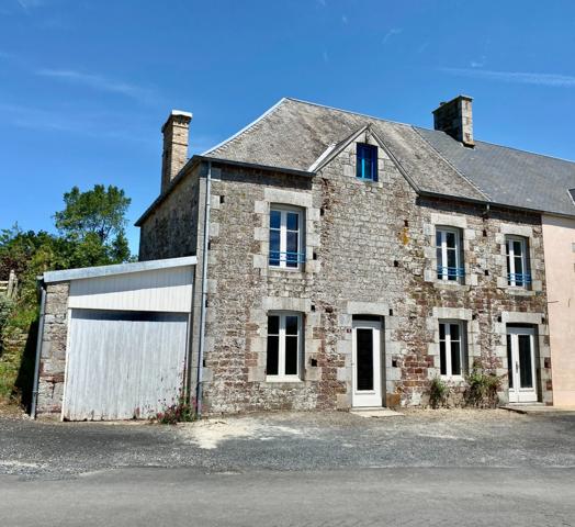 A vendre - Maison mitoyenne de 135 m² à finir à rénover avec jardin, garage et grenier, proche Saint Lo