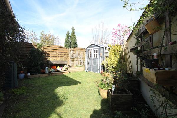 Appartement F4 avec jardin et garage