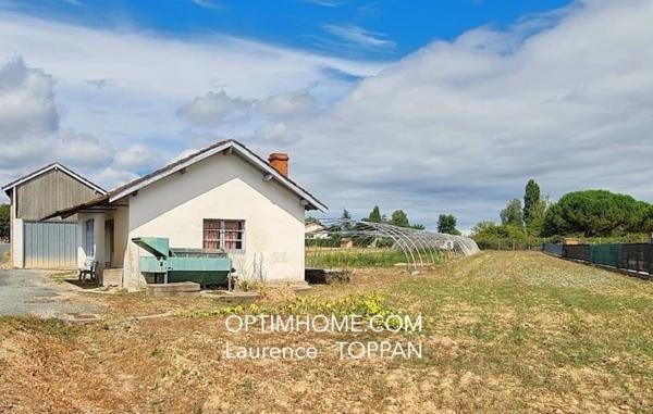 TERRAIN AVEC 2 DEPENDANCES