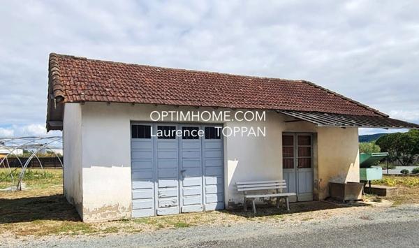 TERRAIN AVEC 2 DEPENDANCES