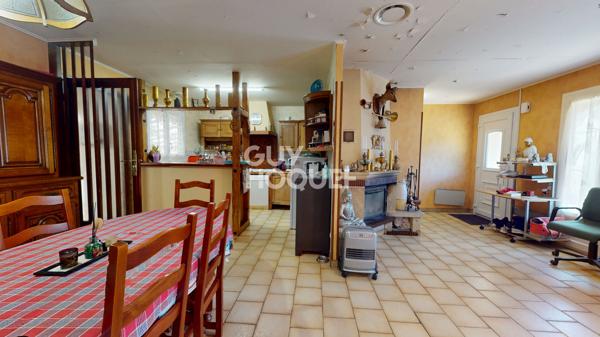 Maison trois chambres avec garage et carport