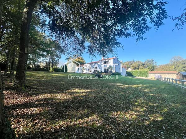 Maison 4 chambres - garage - carport - grand jardin