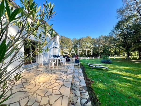 Maison 4 chambres - garage - carport - grand jardin