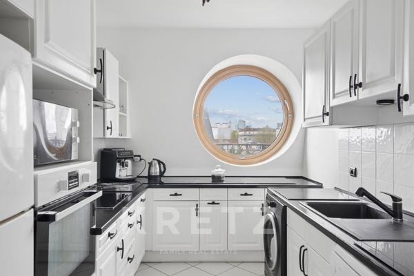 Dernier étage avec terrasse plein ciel et vue Tour Eiffel