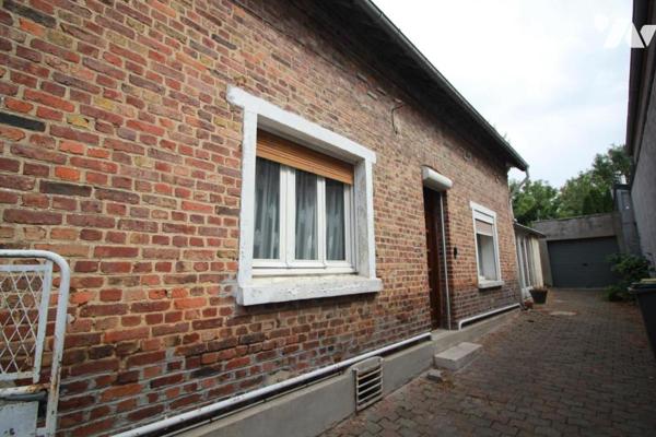 Proche CAMBRAI, longère individuelle de  90 m² 2 chambres terrain et garage