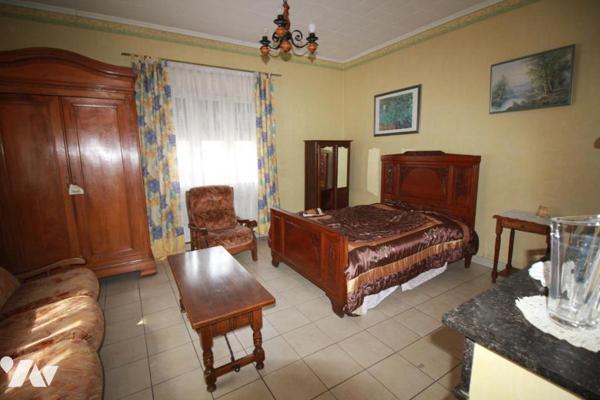 Proche CAMBRAI, longère individuelle de  90 m² 2 chambres terrain et garage