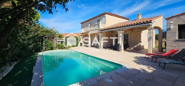 "Spacieuse villa avec piscine, cadre résidentiel prisé"