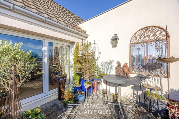 Duplex chaleureux et sa terrasse avec vue dégagée
