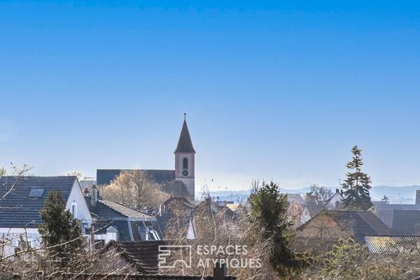 Duplex chaleureux et sa terrasse avec vue dégagée