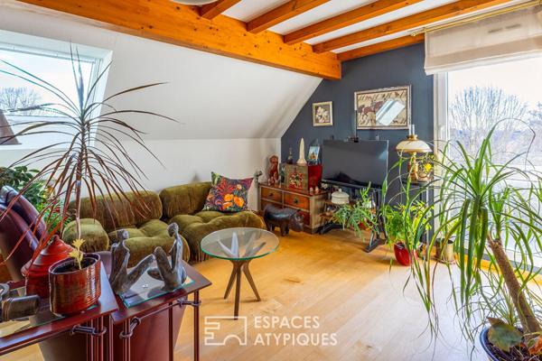 Duplex chaleureux et sa terrasse avec vue dégagée