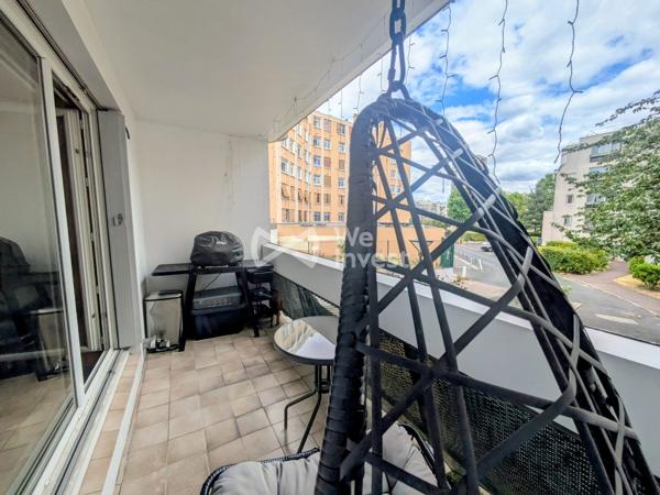Appartement 3 chambres , stationnement et cave