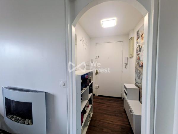 Appartement 3 chambres , stationnement et cave