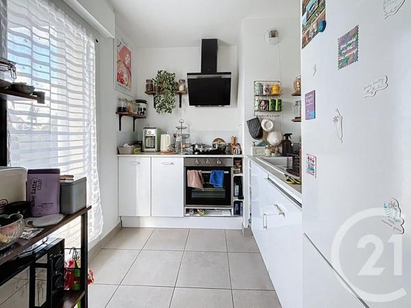 Appartement F3 à vendre  3 pièces - 63,01 m 2   HOUILLES  - 78